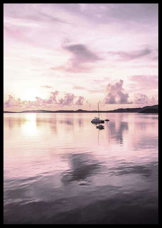 Photograph of sailboat on calm sea with purple sunset-12