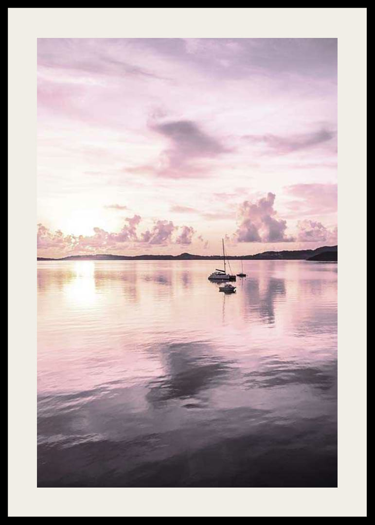 Photograph of sailboat on calm sea with purple sunset-12