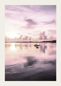 Photograph of sailboat on calm sea with purple sunset-3