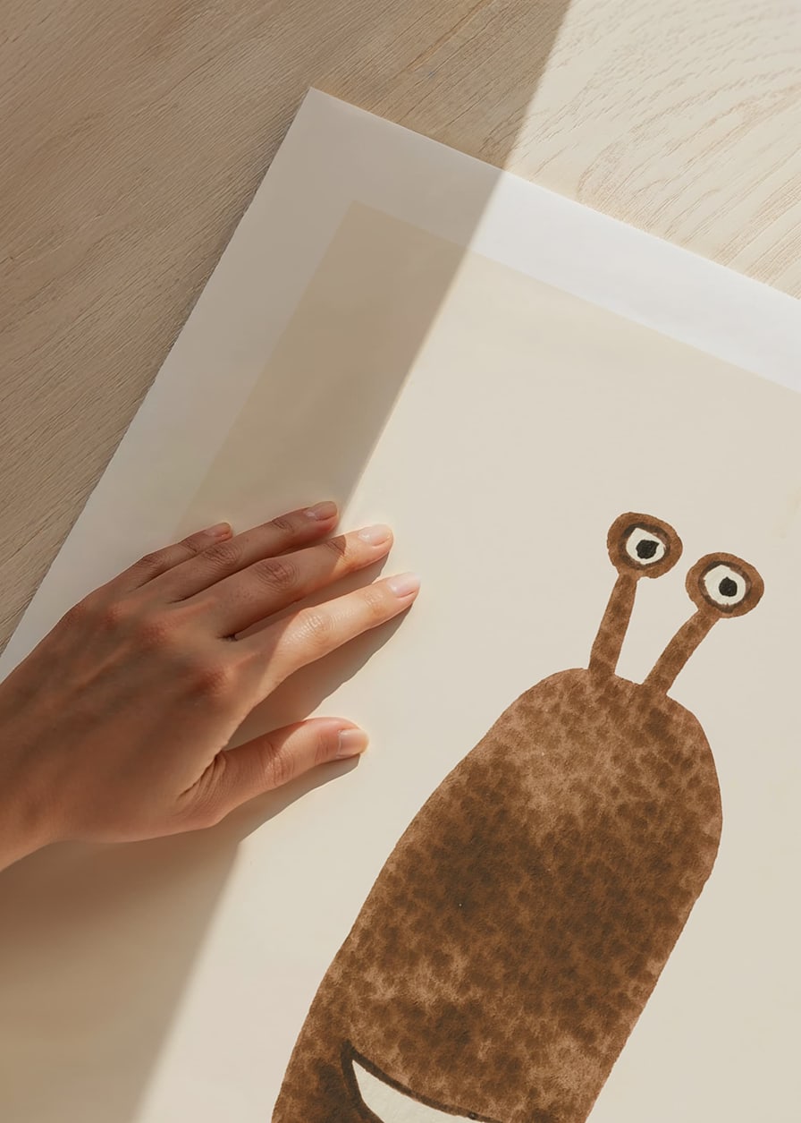 Brown illustrated monster with big eyes on light background-12
