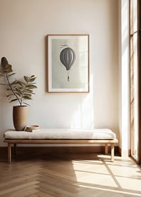 Illustration of man hanging from hot air balloon in muted tones-8