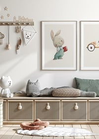 Illustrated young hare in blue overalls with red book-8
