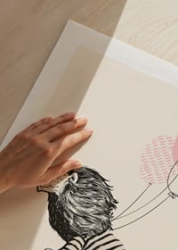 Illustrated lion with striped shirt riding a bike with pink balloons-9