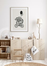 Illustrated bear with striped sweater on bike and balloons-8