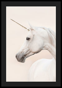 Close-up of white unicorn with long horn against light background-4