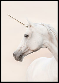 Close-up of white unicorn with long horn against light background-6
