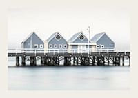 Photograph of blue beach houses on stilts on the waterfront in Busselton-3