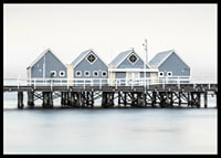 Photograph of blue beach houses on stilts on the waterfront in Busselton-6