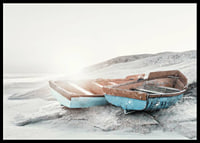 Photograph of two worn wooden boats on a light cliff-6