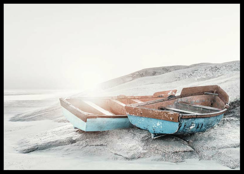 Photograph of two worn wooden boats on a light cliff-12