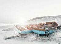 Photograph of two worn wooden boats on a light cliff-7