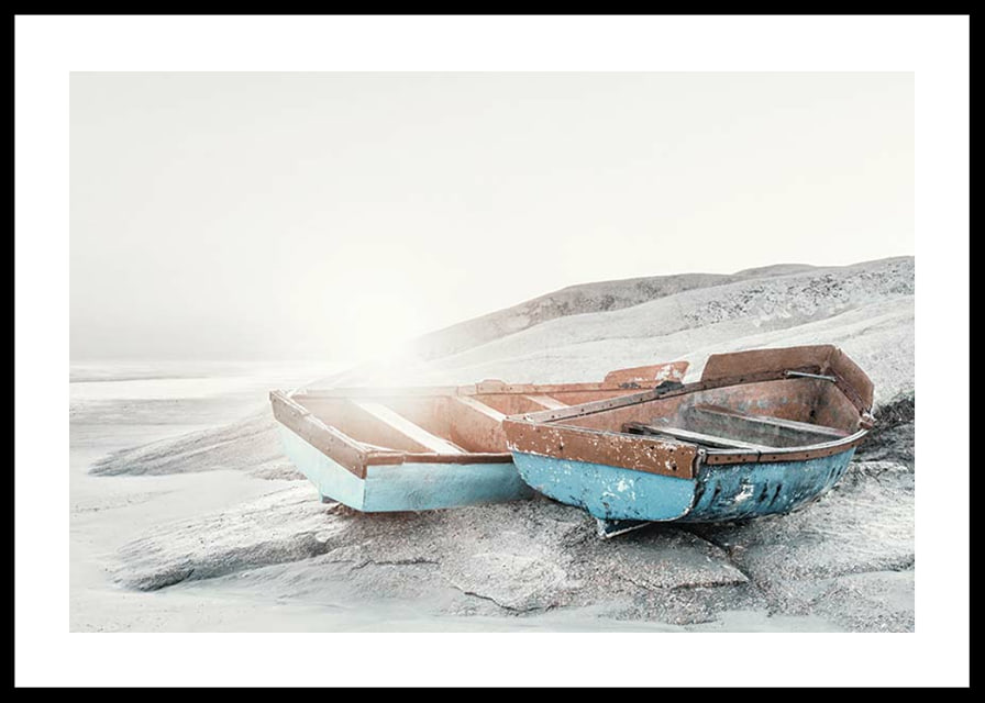 Photograph of two worn wooden boats on a light cliff-12