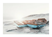 Photograph of two worn wooden boats on a light cliff-1