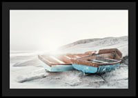Photograph of two worn wooden boats on a light cliff-4