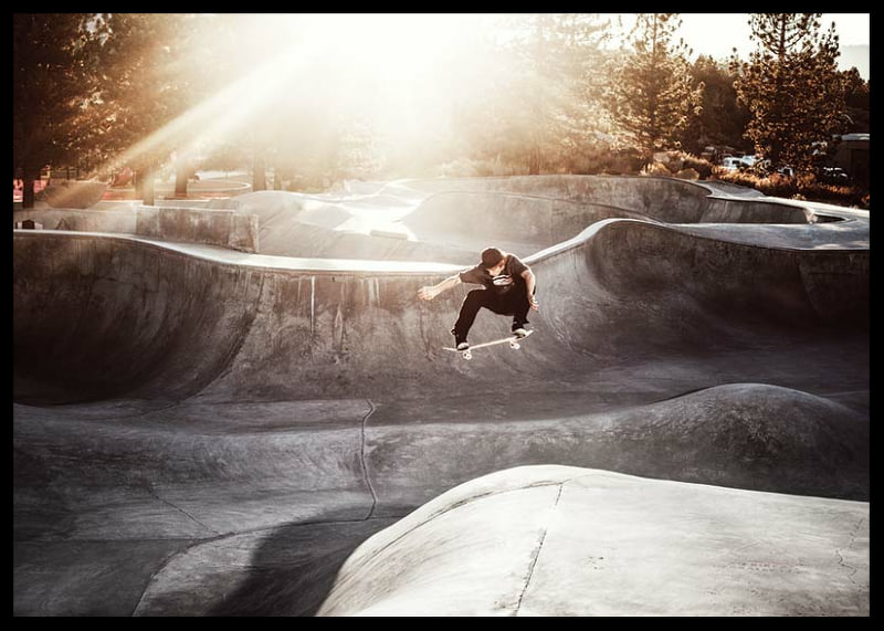 Photography of skateboarder in concrete park with backlight-12
