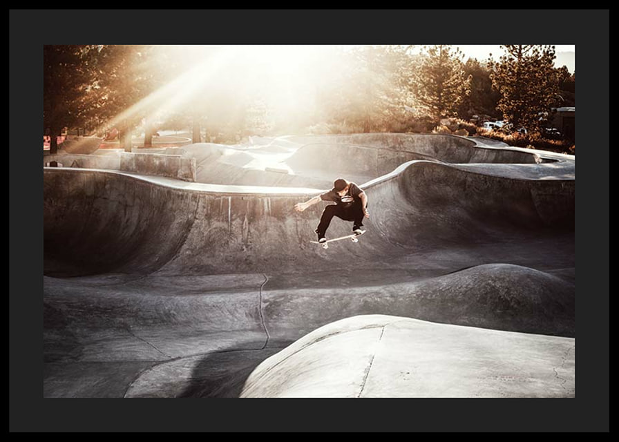 Photography of skateboarder in concrete park with backlight-12
