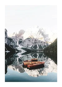 Photograph of rowboats on mirror-like lake, snow-capped mountains-1