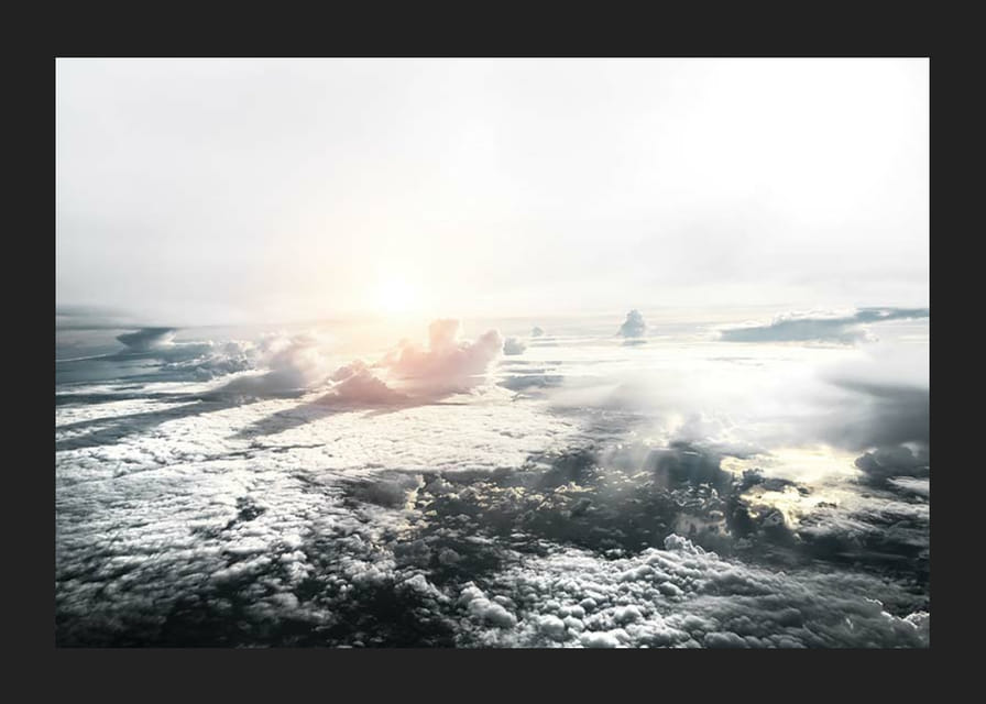 Fotografia della copertura nuvolosa e della luce solare ripresa dall'alto-12