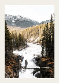 Photograph of cascading waterfall with pine forest and snow-capped mountains-3