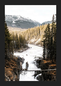 Photograph of cascading waterfall with pine forest and snow-capped mountains-5
