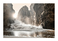 Photograph of waves crashing against rocks in soft backlight-1