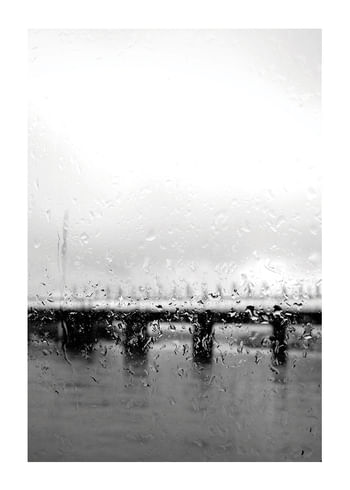 Poster Behind Rain Drops