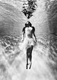 Black and white photo art of woman in dress under water surface-7