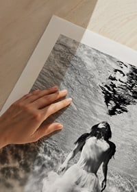 Black and white photo art of woman in dress under water surface-9