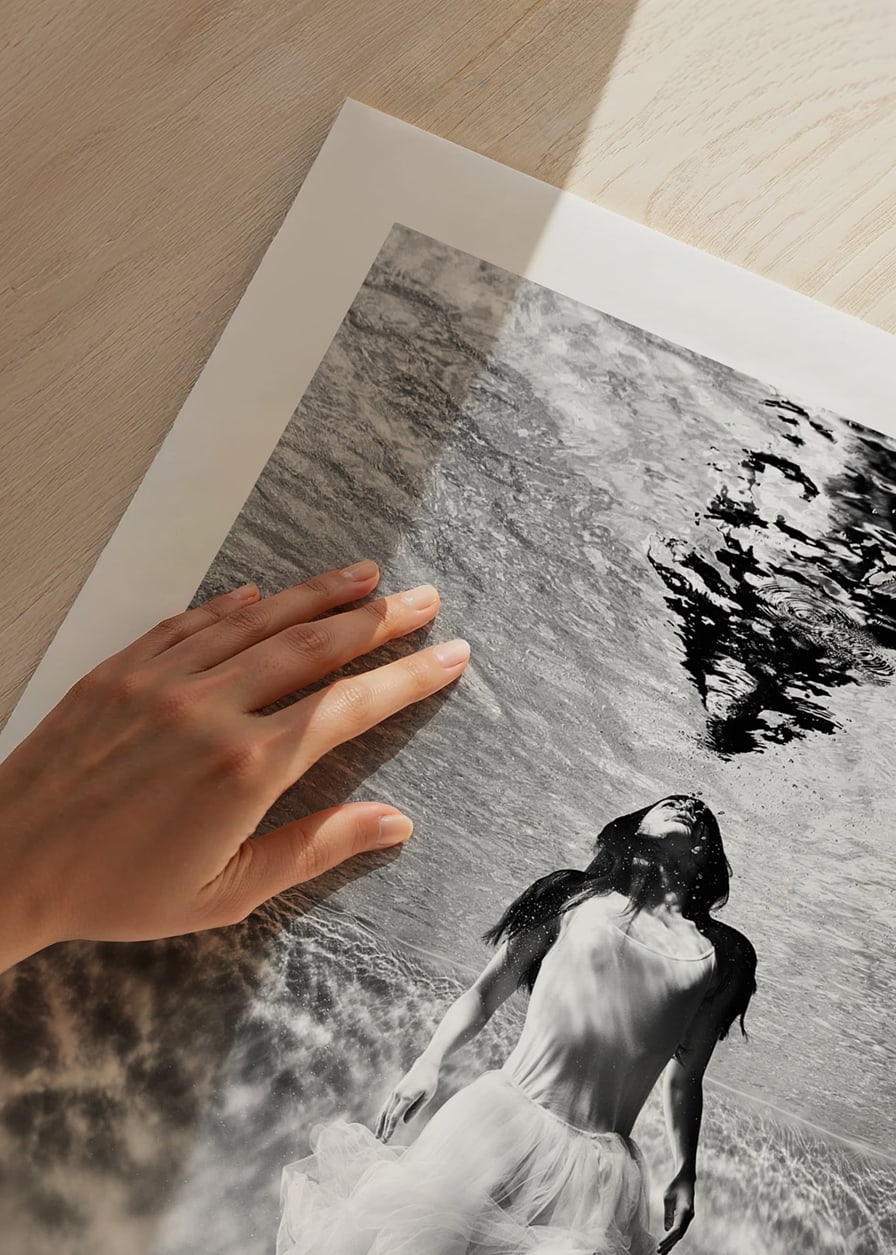 Black and white photo art of woman in dress under water surface-12