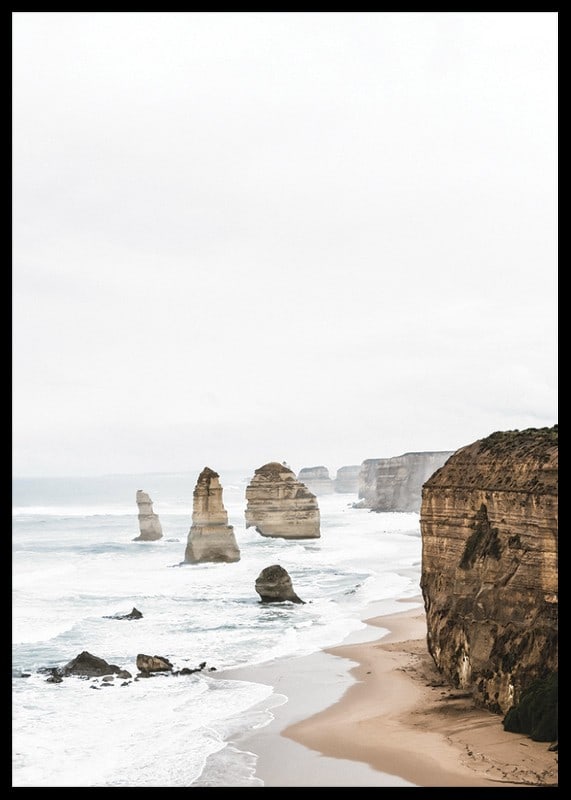 Photograph of steep cliffs and sea pillars on a bright coast-12