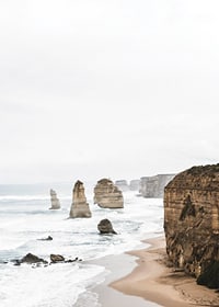 Photograph of steep cliffs and sea pillars on a bright coast-7
