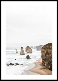 Photograph of steep cliffs and sea pillars on a bright coast-0