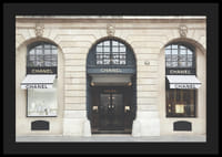 Photograph of Chanel store in classic stone building, light tones-4