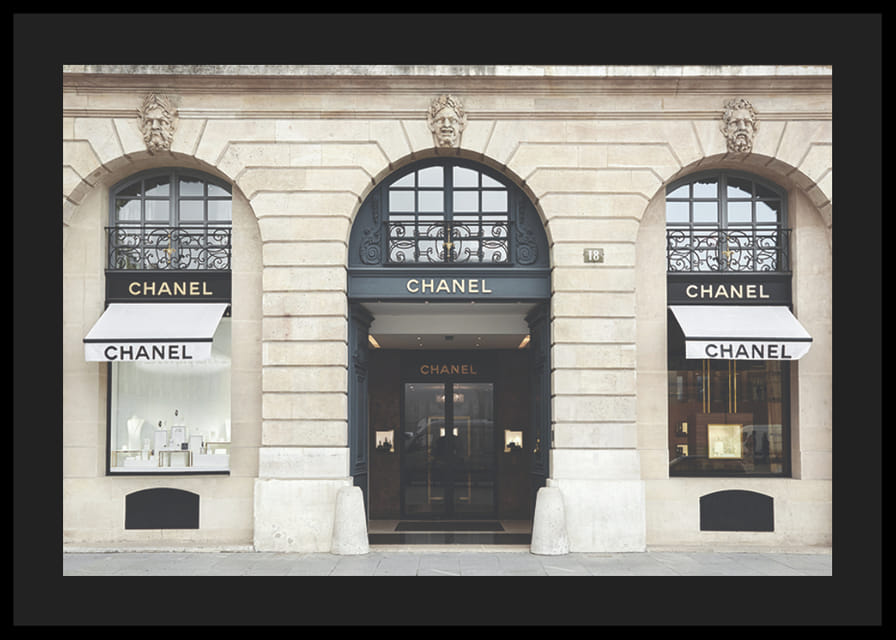 Photograph of Chanel store in classic stone building, light tones-12