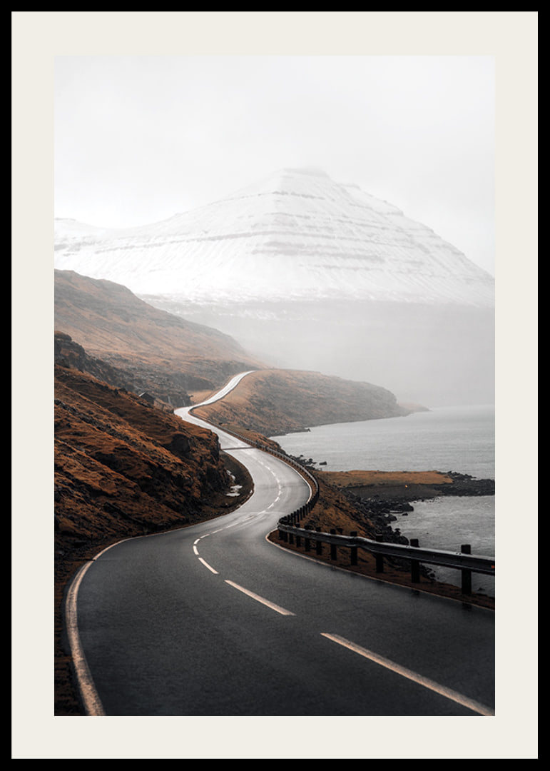 Photographic landscape with winding road, sea and snow-capped mountains-12
