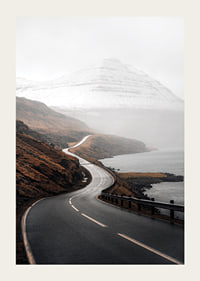 Photographic landscape with winding road, sea and snow-capped mountains-3