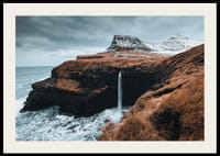 Photographic landscape with tall waterfall on barren coast-2