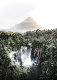 Bright photography of waterfall in tropical jungle with volcano-7