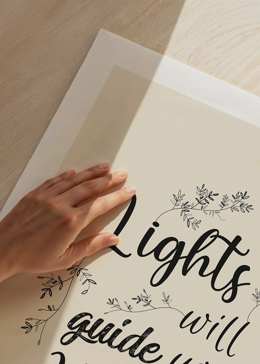 Black text with curved letters and leaf decorations on beige background-12