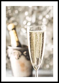 Photographic close-up of champagne glass with bubbles and blurred bottle in the background-0