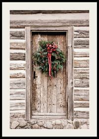 Fotografi af julekrans med rød sløjfe på en farvet trædør-2