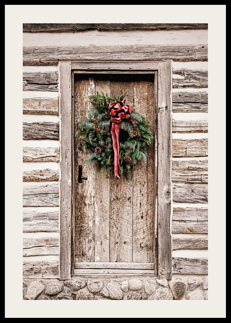 Fotografi af julekrans med rød sløjfe på en farvet trædør-12