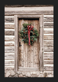 Fotografi af julekrans med rød sløjfe på en farvet trædør-5