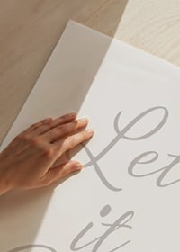 Beige text Let it Snow in italic style on white background-3