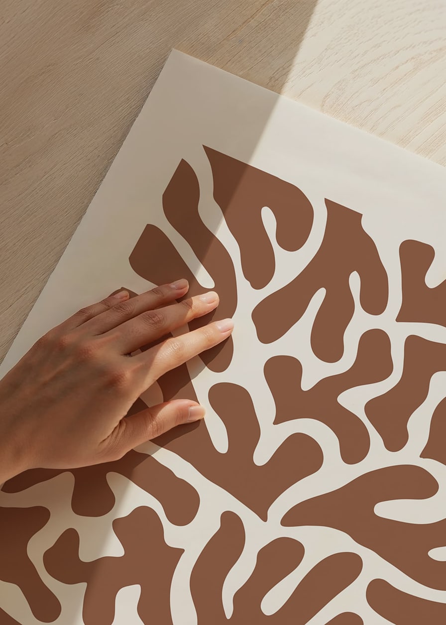 Abstract brown organic shapes against sand colored background-12