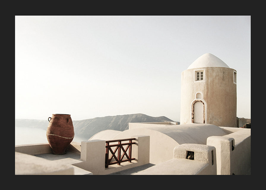 Photograph of whitewashed buildings and pot in Greece-12