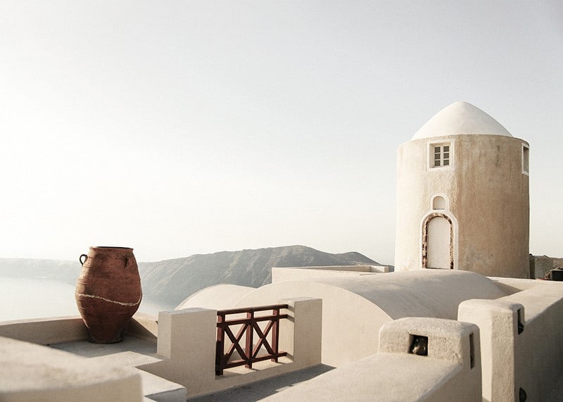 Photograph of whitewashed buildings and pot in Greece-12