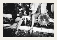 Black and white photograph of two women on party stairs with disco ball-3