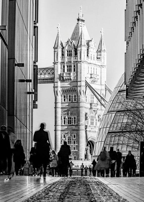 Black and white photograph of Tower Bridge with silhouettes of people-12