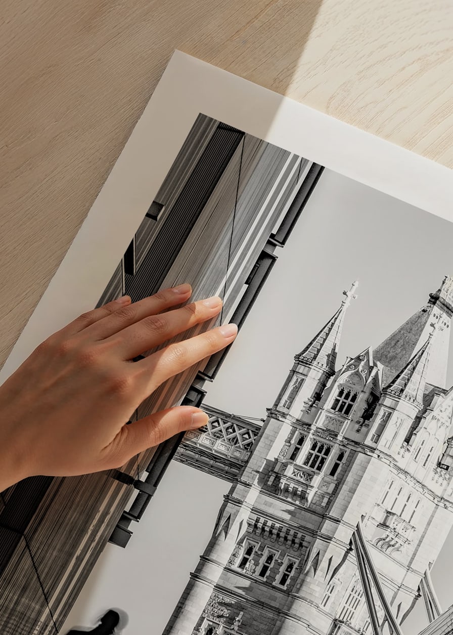 Black and white photograph of Tower Bridge with silhouettes of people-12